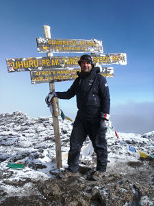 Dan Jane reaches the summit of Kilimanjaro